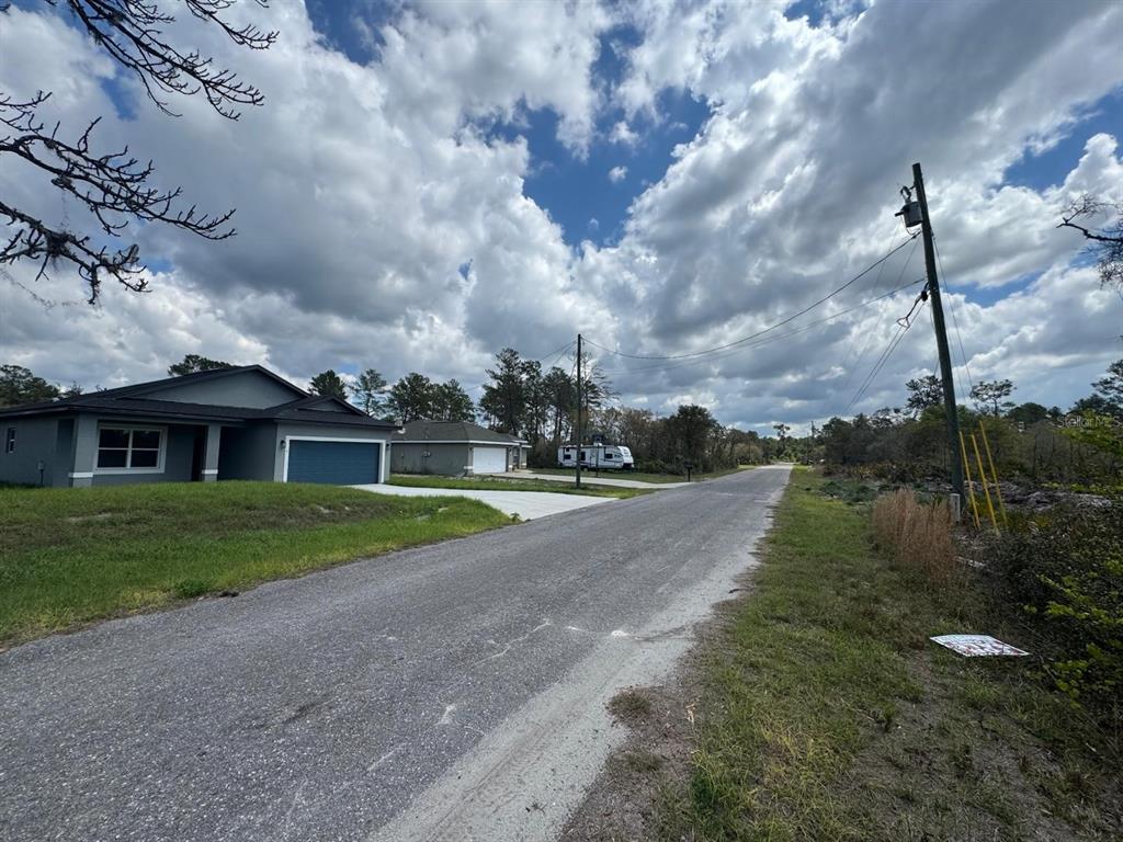 Fisher Loop Pass Ocklawaha, FL 32179 - Photo 1 of 4 a view of a house with a yard