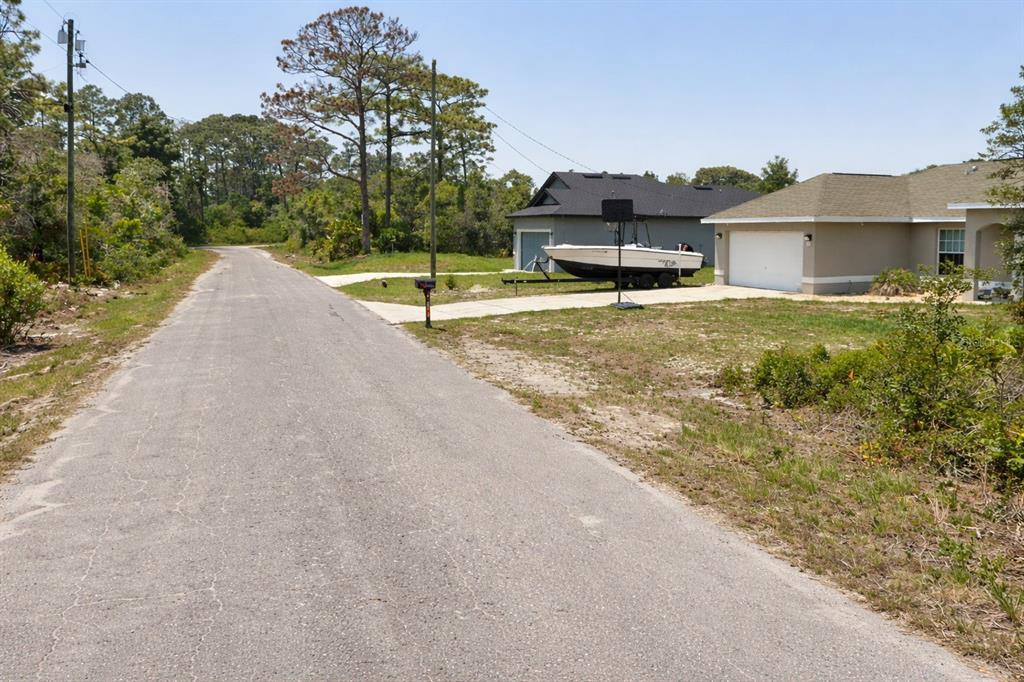Fisher Loop Pass Ocklawaha, FL 32179 - Photo 4 of 4 a house view with a outdoor space