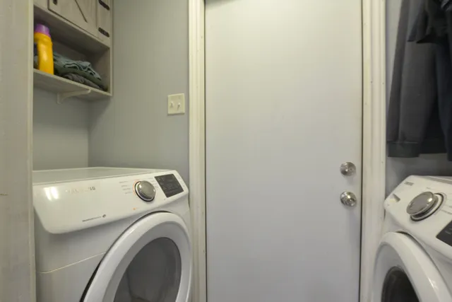 a view of washer and dryer in a utility room