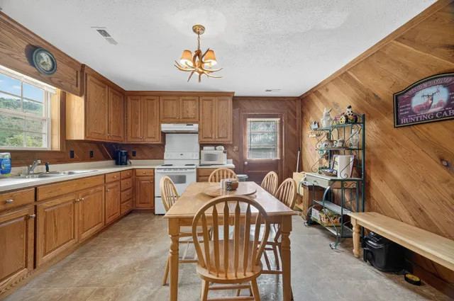 a kitchen that has a cabinets counter space and appliances