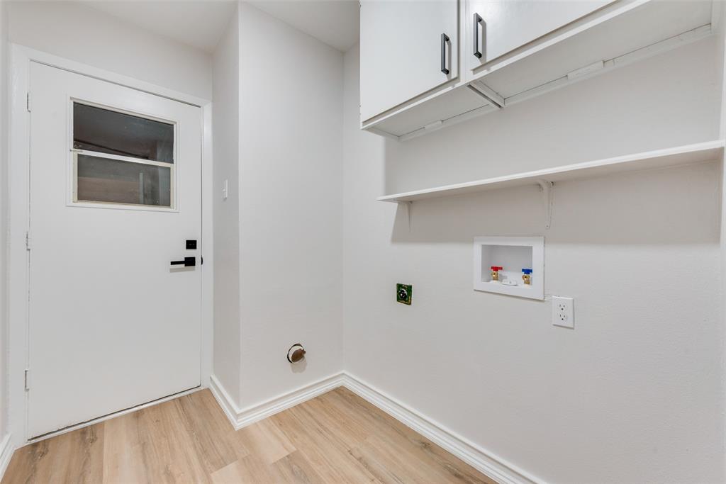 4117 Spokane Street Irving, TX 75062 - Photo 13 of 28 a view of small space with racks on the wall