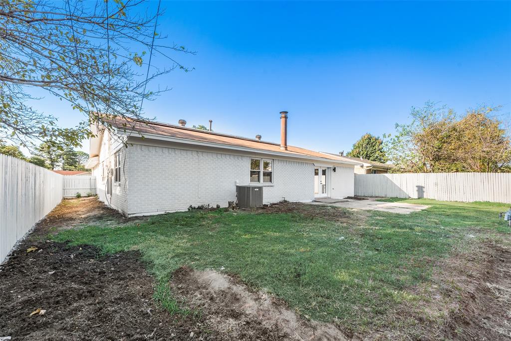 4117 Spokane Street Irving, TX 75062 - Photo 26 of 28 a view of a house with a yard