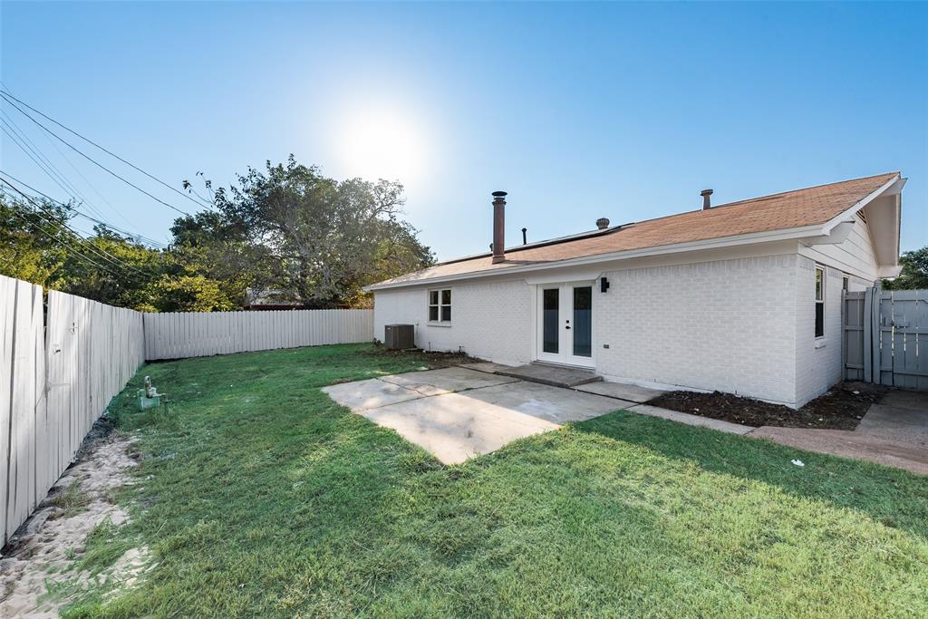 4117 Spokane Street Irving, TX 75062 - Photo 27 of 28 a house view with a backyard space