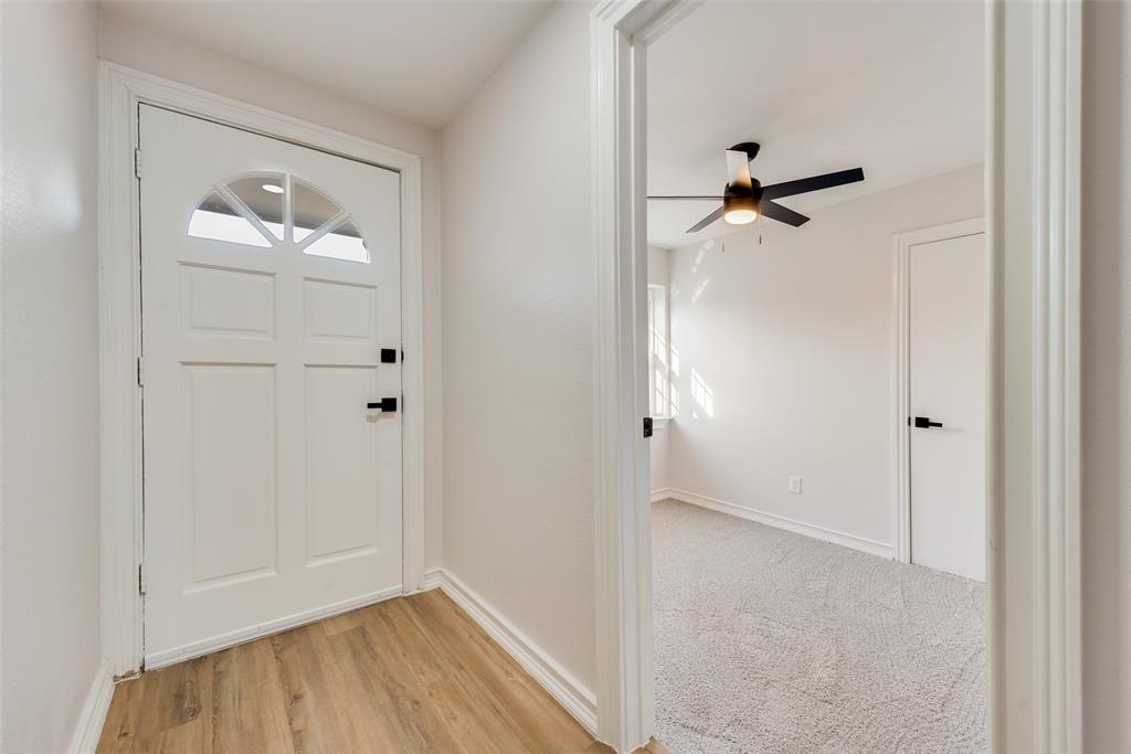 4117 Spokane Street Irving, TX 75062 - Photo 5 of 28 a view of empty room with wooden floor