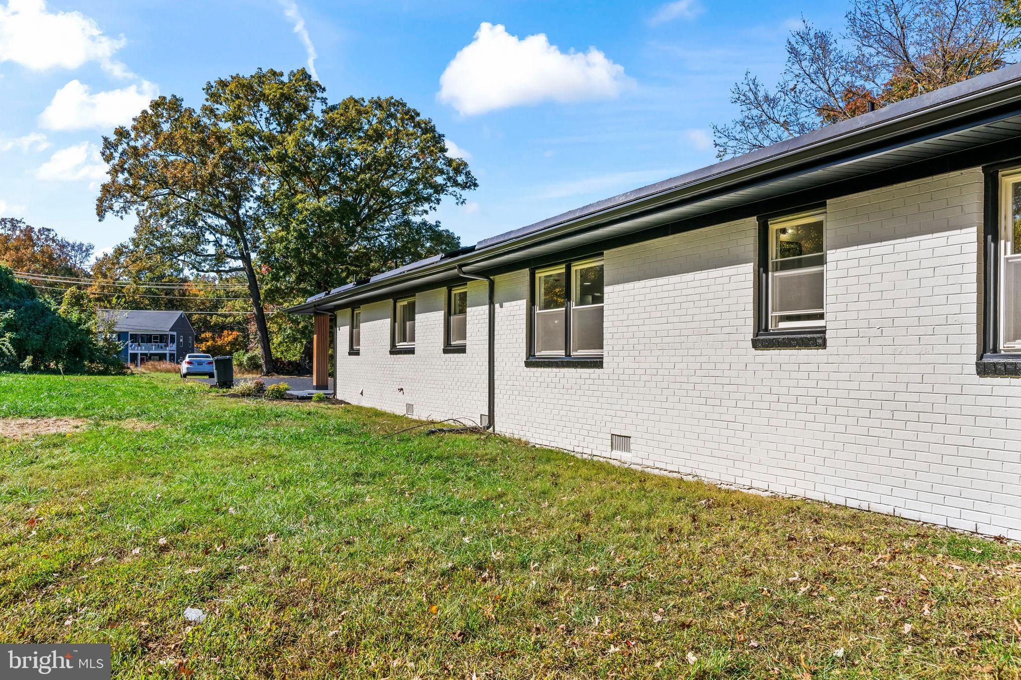 719 Manning Road East Accokeek, MD 20607 - Photo 36 of 36 Modern home with lush green surroundings.
