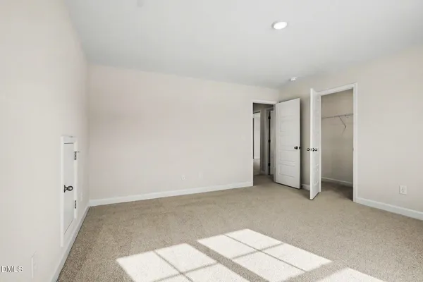 an empty room with an entryway