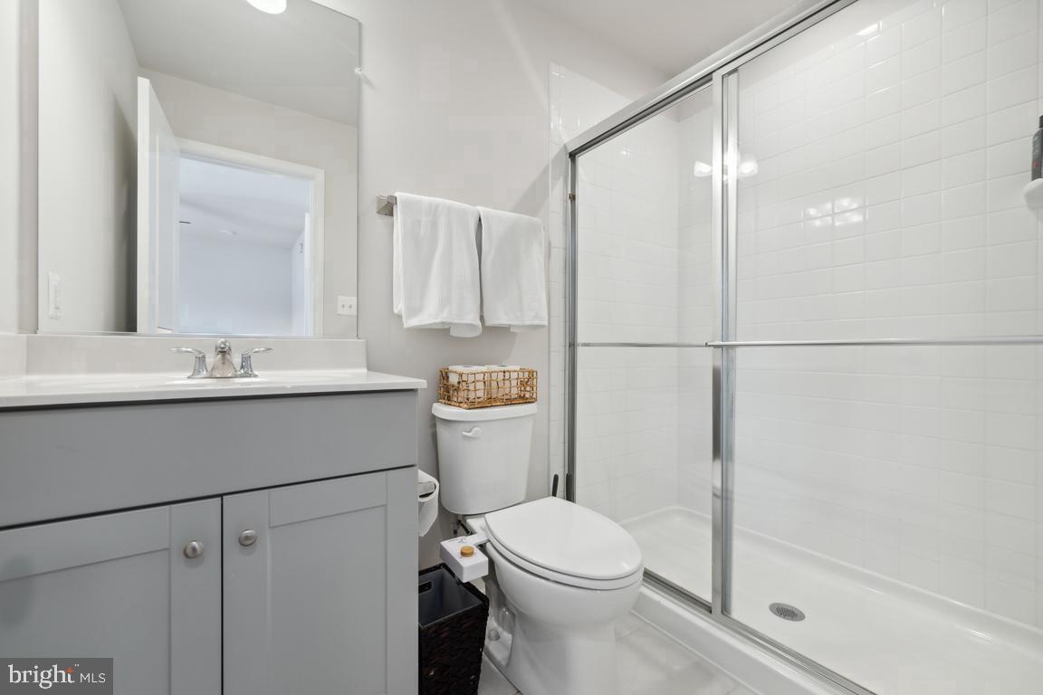 195 Presidents Pointe Avenue Ranson, WV 25438 - Photo 12 of 22 a bathroom with a sink mirror vanity and toilet