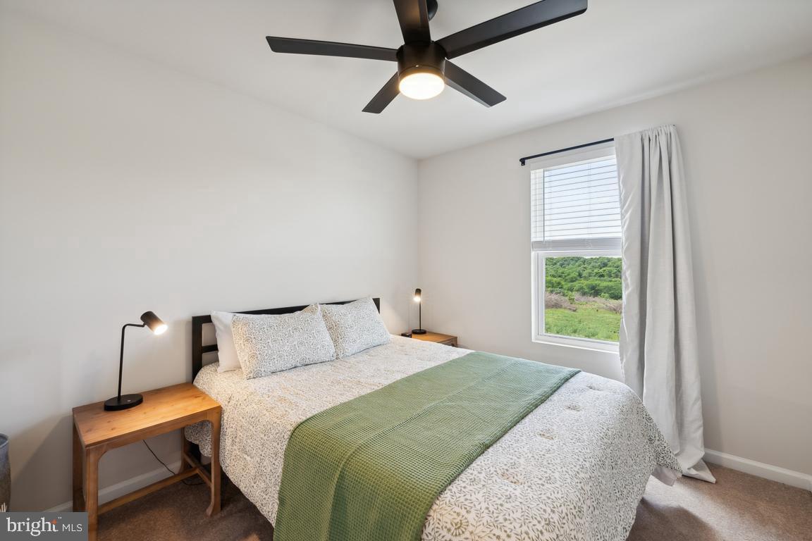195 Presidents Pointe Avenue Ranson, WV 25438 - Photo 14 of 22 a bedroom with a bed and window