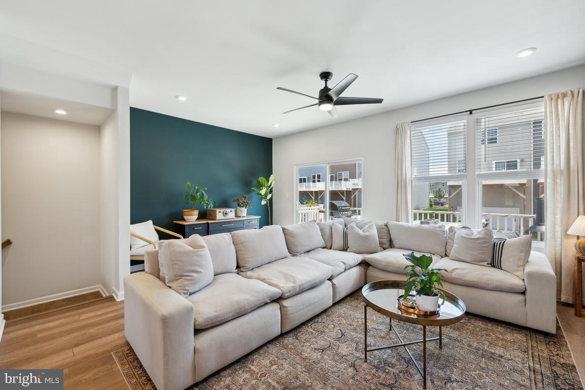 195 Presidents Pointe Avenue Ranson, WV 25438 - Photo 3 of 22 a living room with furniture and a large window