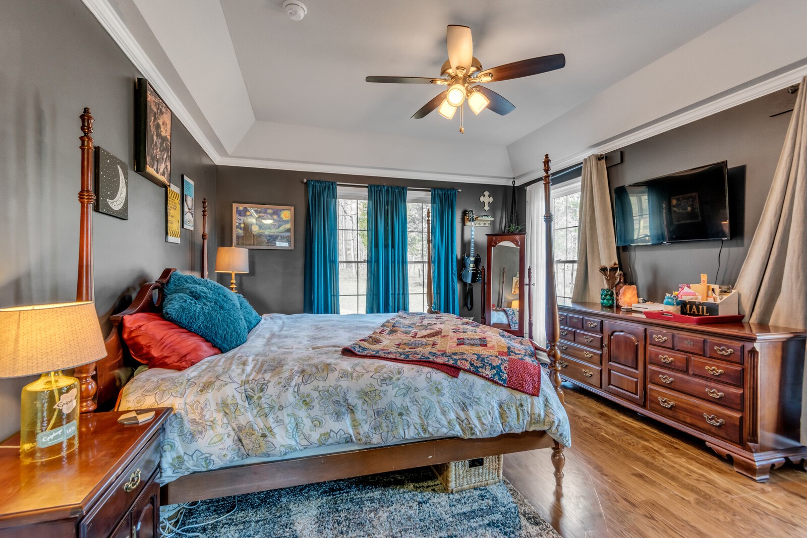 285 Heggie Road Erin, TN 37061 - Photo 19 of 50 a bedroom with a bed and a flat screen tv