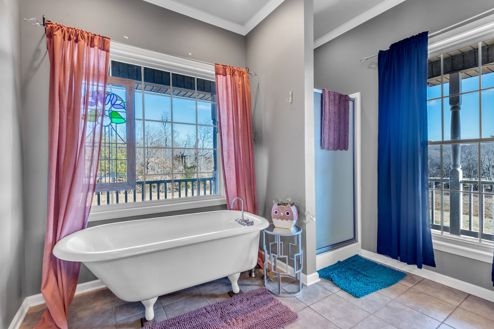 285 Heggie Road Erin, TN 37061 - Photo 22 of 50 a bathroom with a bathtub and next to a window
