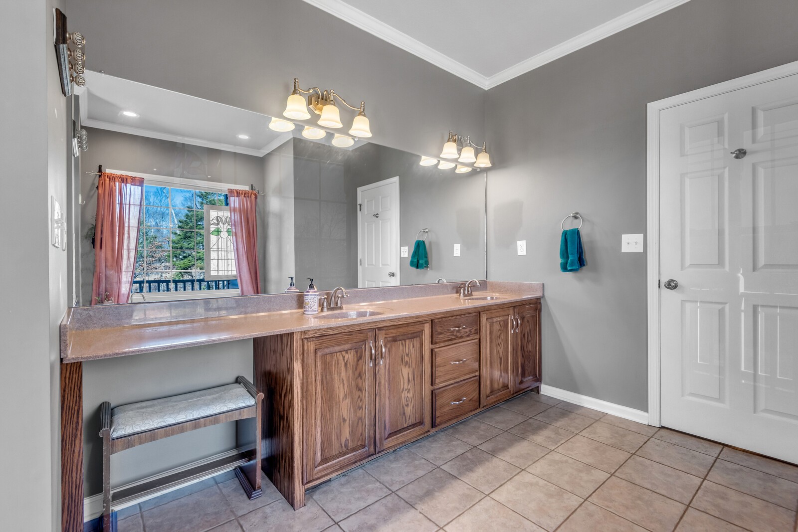 285 Heggie Road Erin, TN 37061 - Photo 23 of 50 a spacious bathroom with a sink a large mirror and a shower