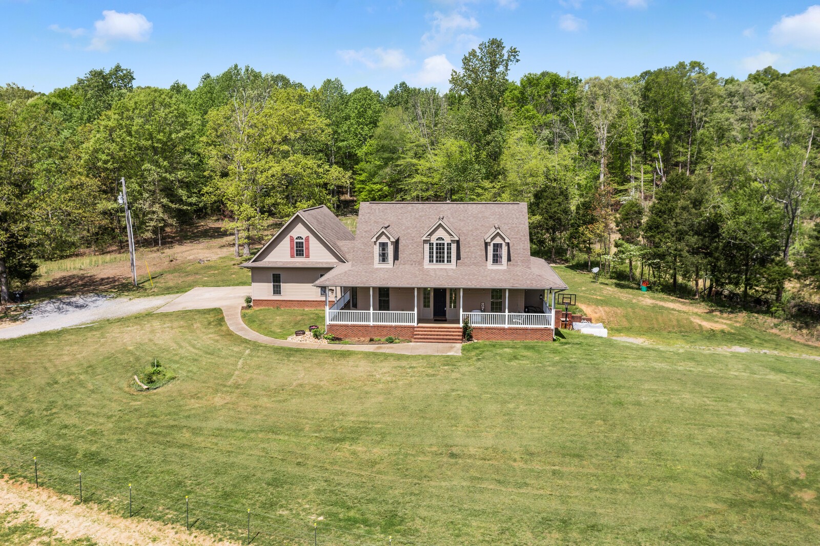 285 Heggie Road Erin, TN 37061 - Photo 3 of 50 a view of a house with a big yard