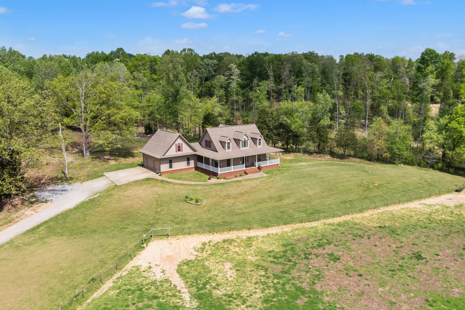 285 Heggie Road Erin, TN 37061 - Photo 34 of 50 a view of a houses with a yard