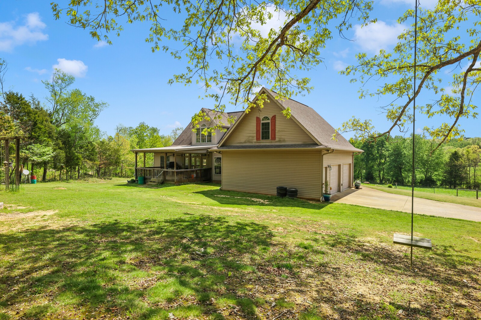 285 Heggie Road Erin, TN 37061 - Photo 41 of 50 a view of a house with a yard