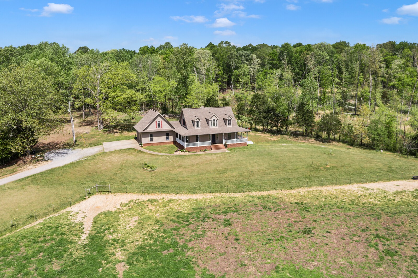 285 Heggie Road Erin, TN 37061 - Photo 42 of 50 a view of a house with a yard