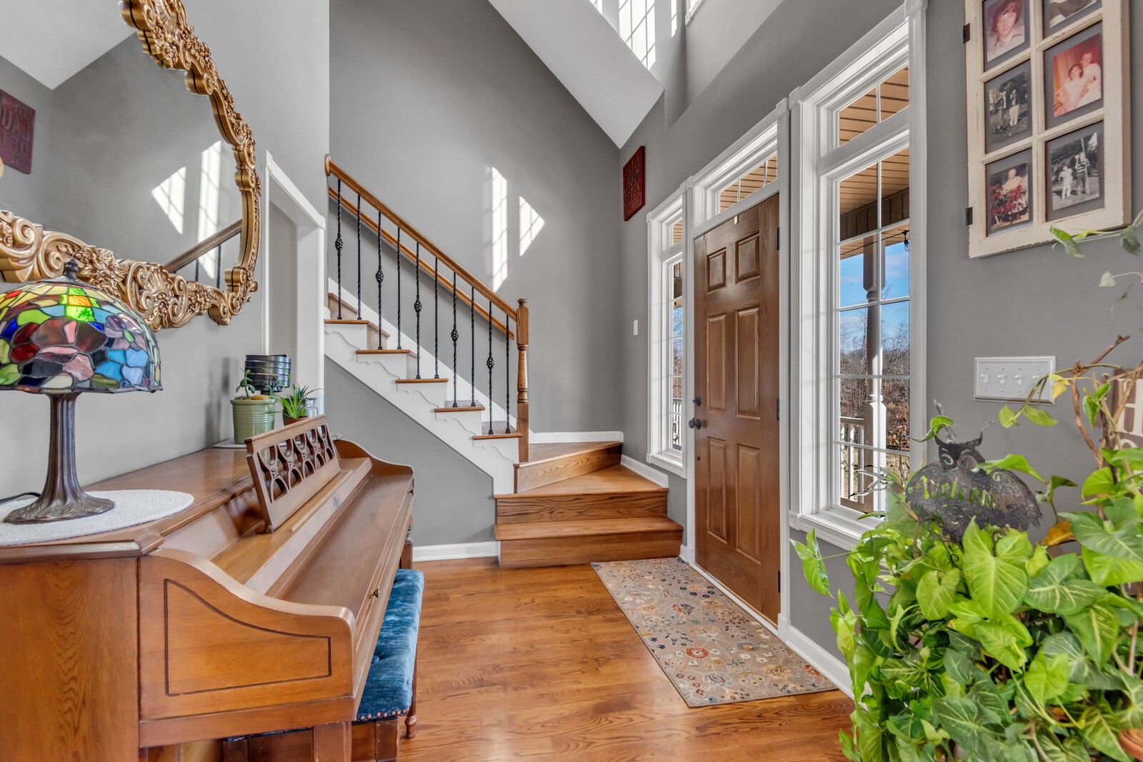 285 Heggie Road Erin, TN 37061 - Photo 7 of 50 a view of an entryway with wooden floor and stairs