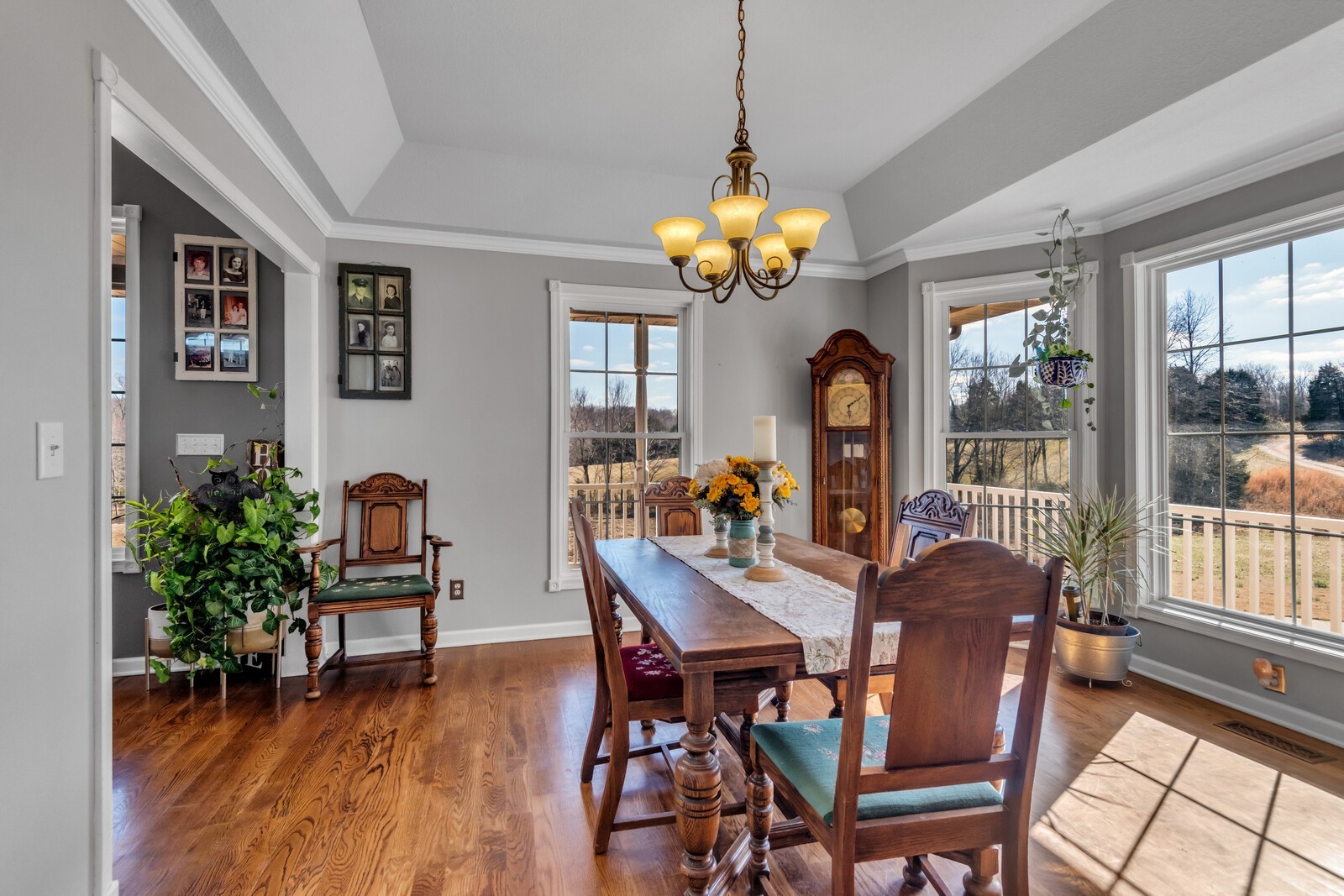 285 Heggie Road Erin, TN 37061 - Photo 8 of 50 a view of a dining room with furniture wooden floor and chandelier