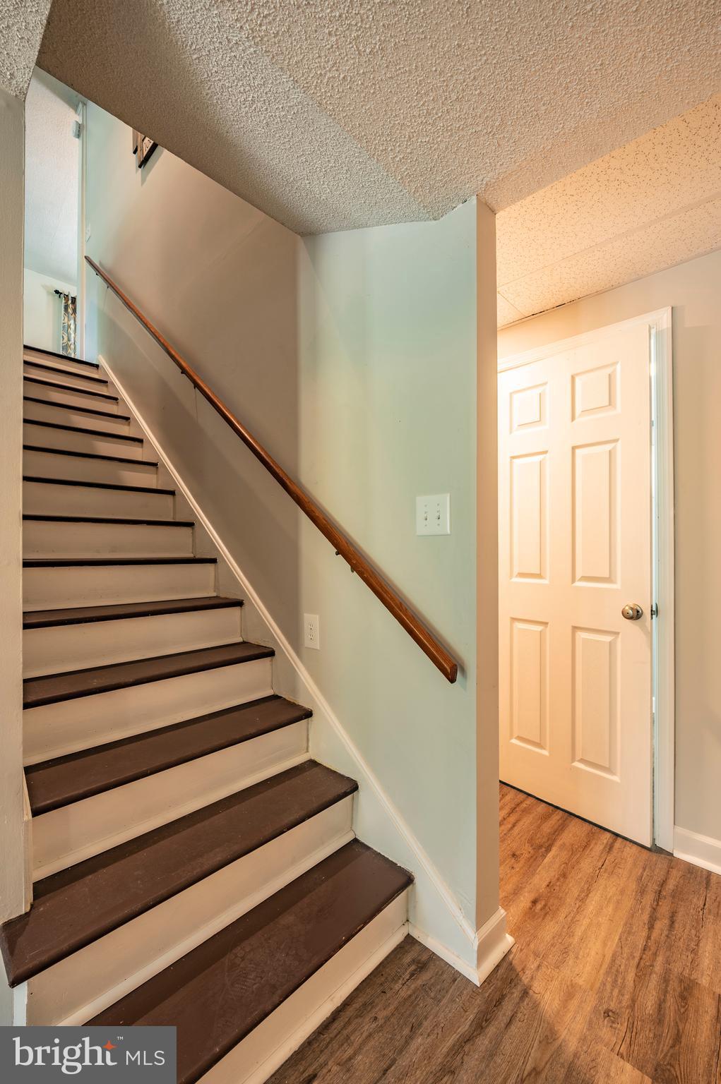 24670 Morgan Road Hollywood, MD 20636 - Photo 13 of 65 Stairwell and Downstairs Full Bath Door