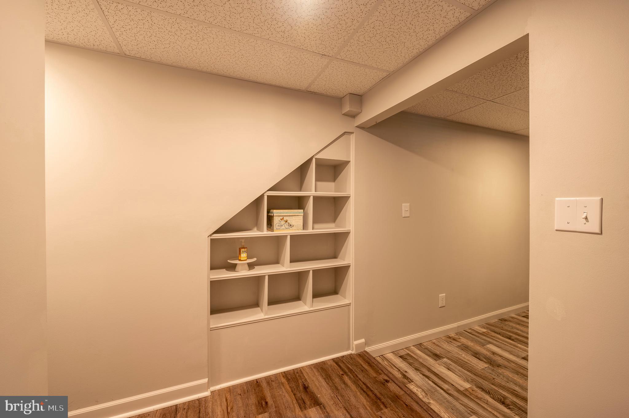24670 Morgan Road Hollywood, MD 20636 - Photo 16 of 65 Built-Ins under stairs in Laundry Room