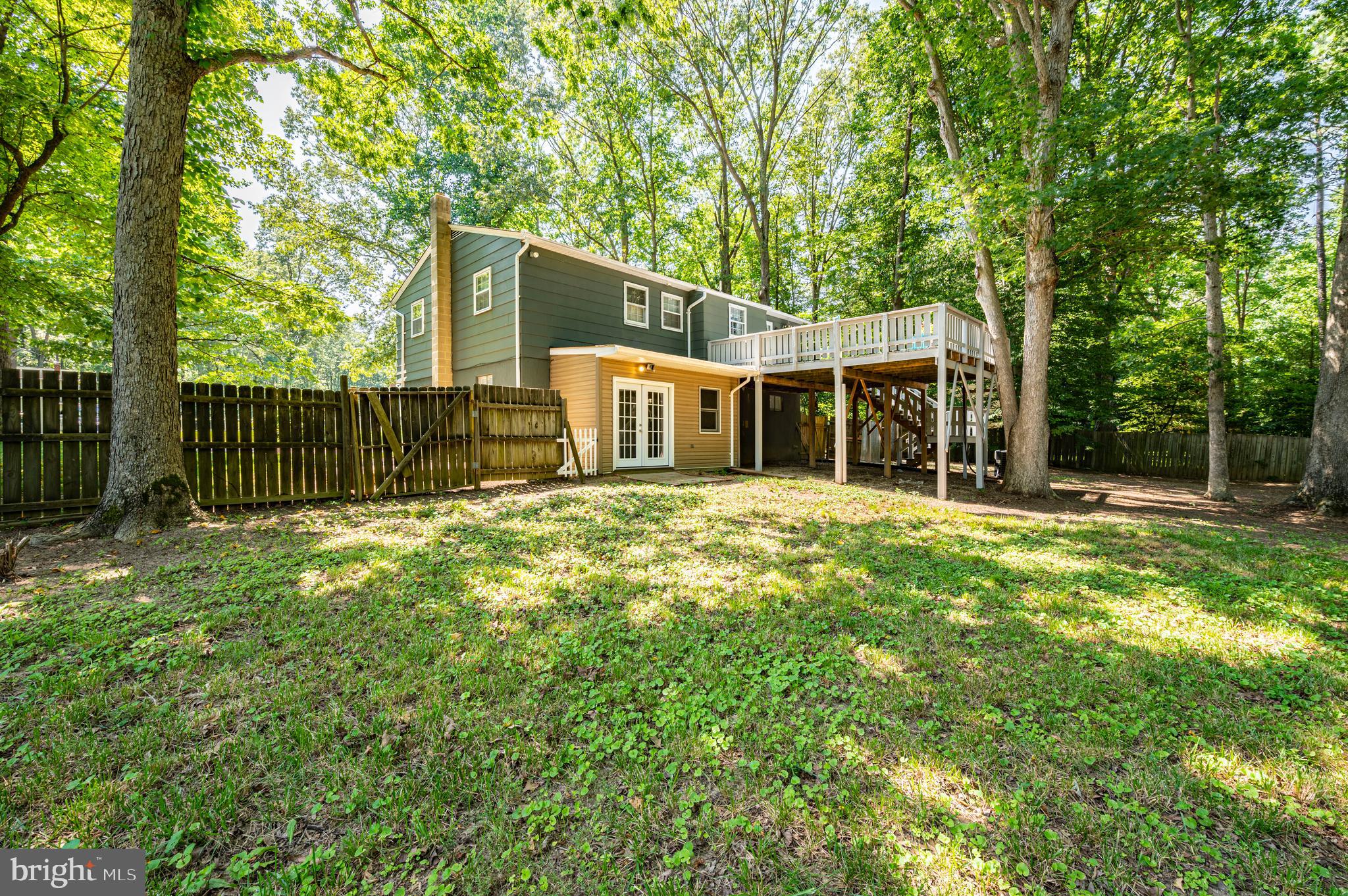 24670 Morgan Road Hollywood, MD 20636 - Photo 59 of 65 Backyard, Doorway to Enclosed Patio