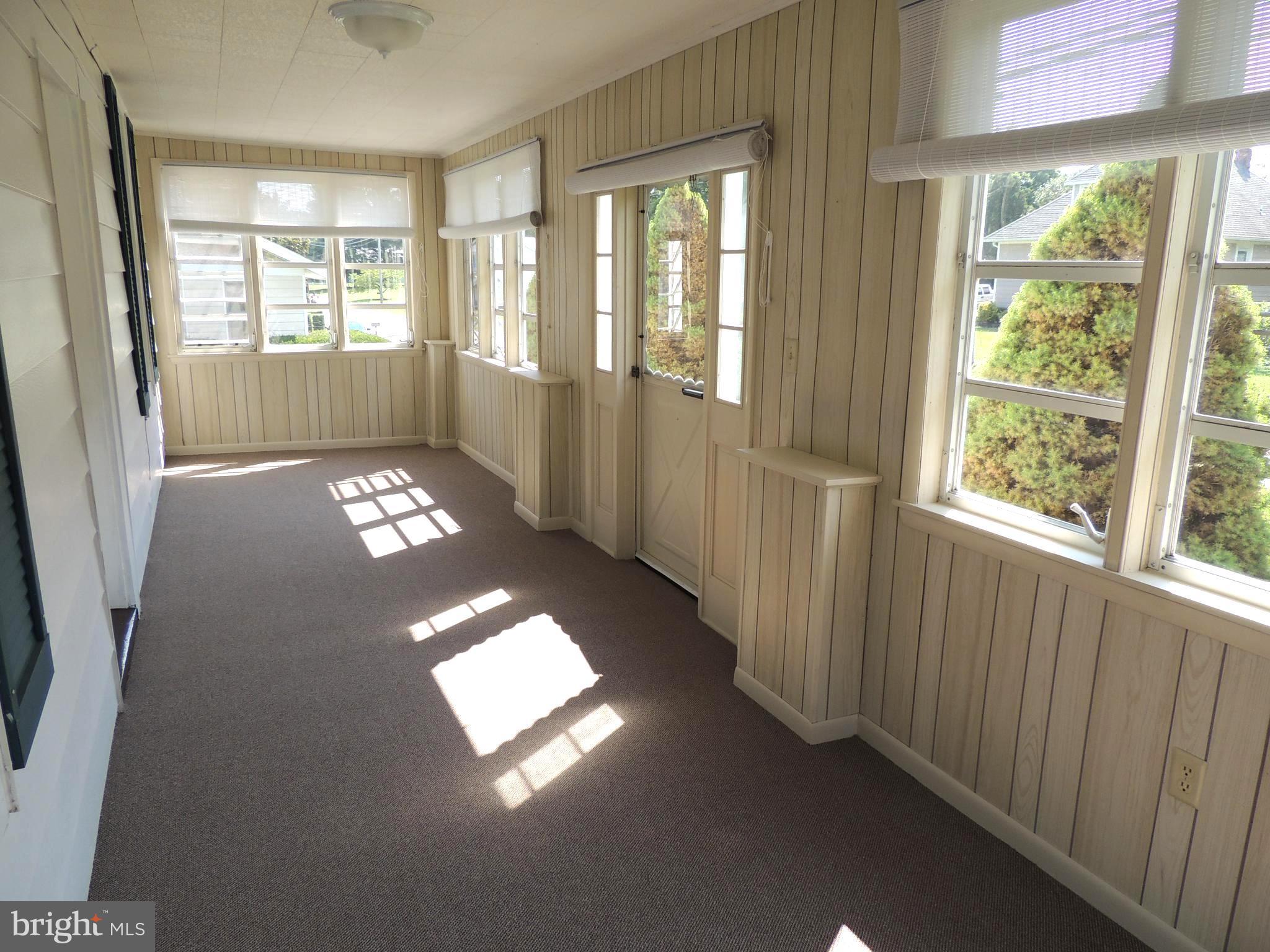 1421 Long Corner Road Mount Airy, MD 21771 - Photo 10 of 27 wooden floor in an empty room with a window