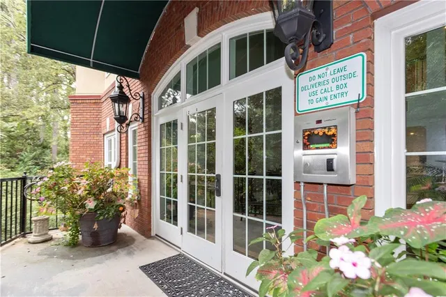 a view of a house with a potted plant