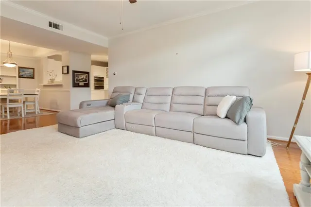 a living room with furniture and a couch