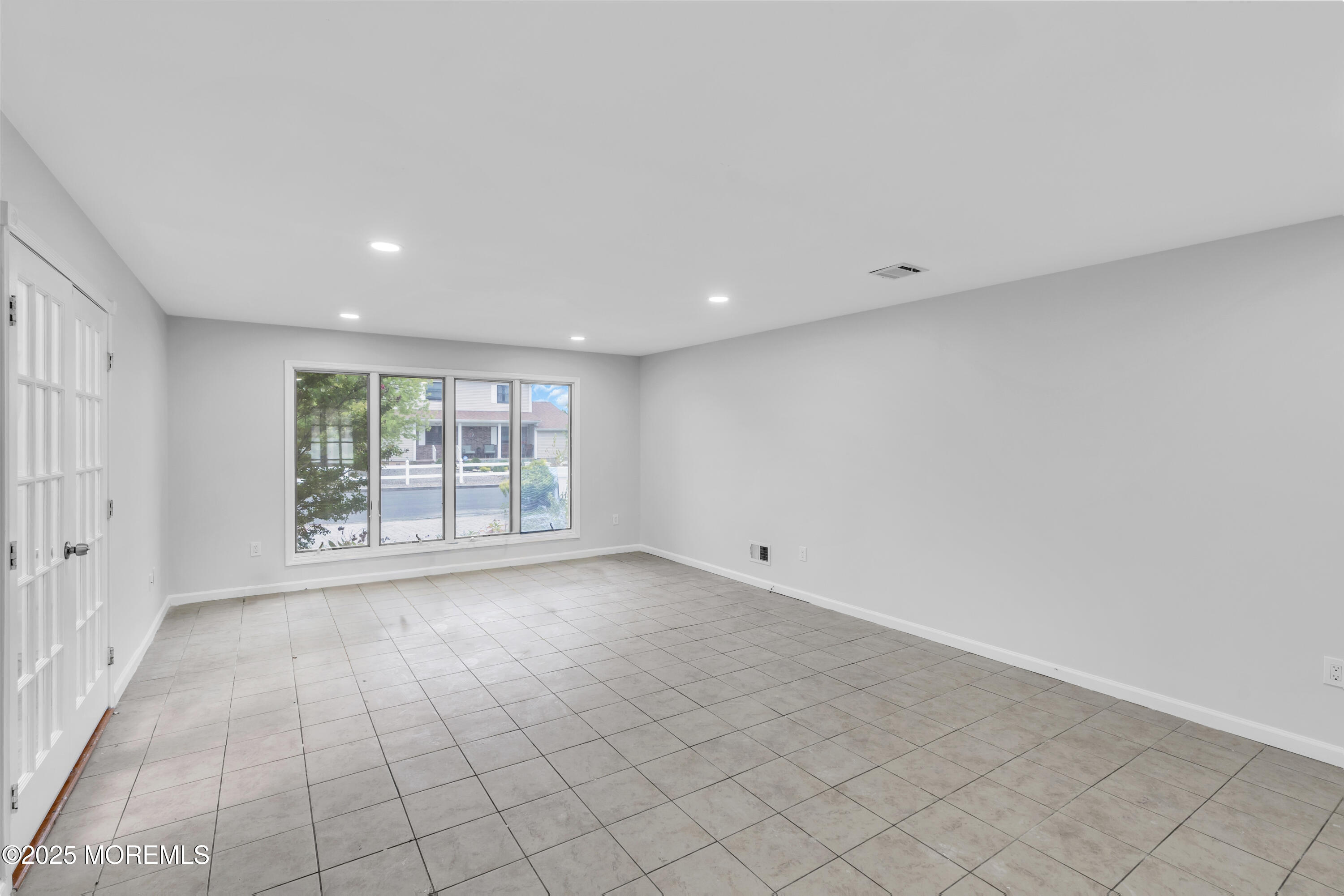 52 16th Street Toms River, NJ 08753 - Photo 14 of 44 a view of an empty room with a window