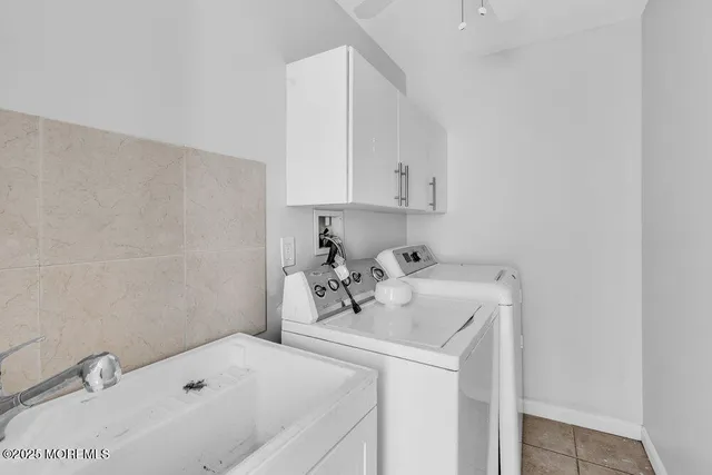 a bathroom with a sink and a bathtub