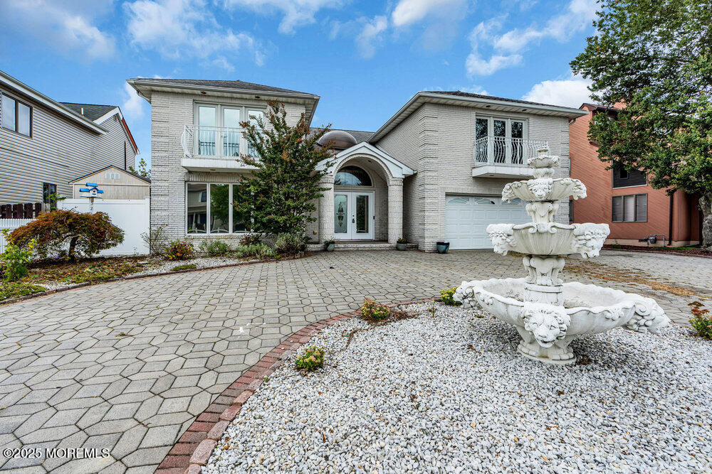 52 16th Street Toms River, NJ 08753 - Photo 2 of 44 a front view of a house with a yard