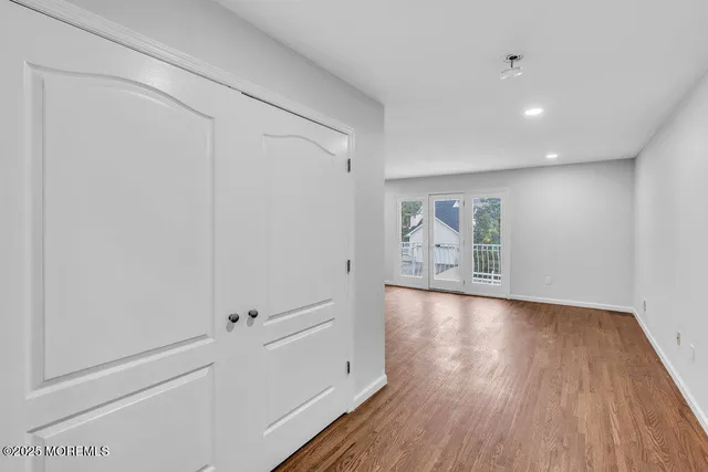 a view of workspace with wooden floor