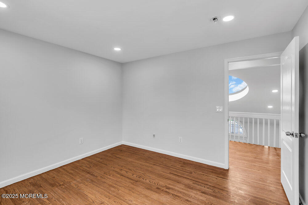 52 16th Street Toms River, NJ 08753 - Photo 32 of 44 a view of empty room with wooden floor