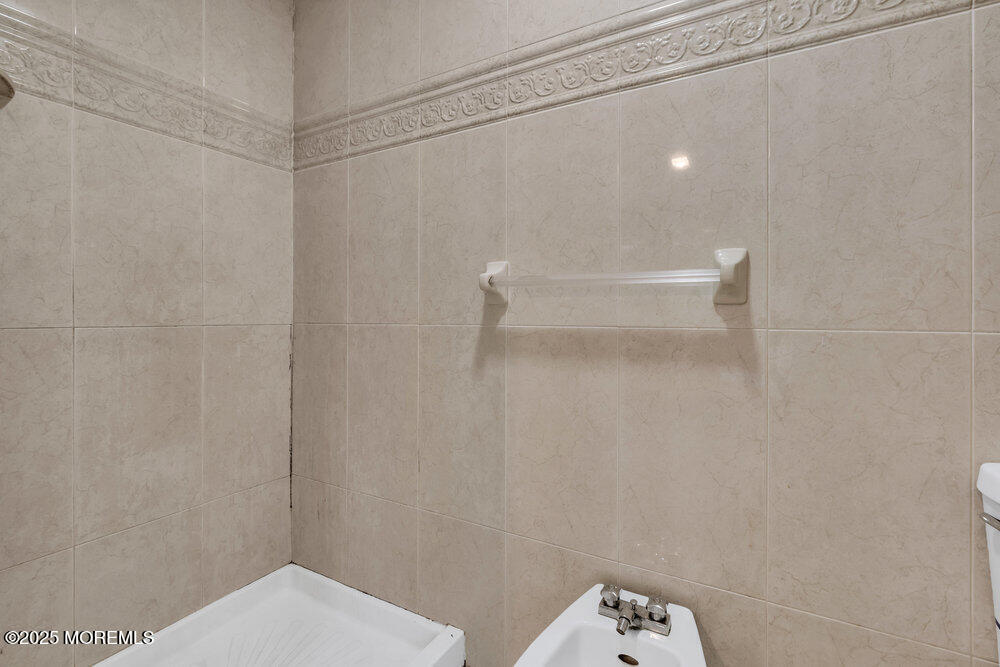 52 16th Street Toms River, NJ 08753 - Photo 34 of 44 a bathroom with a shower