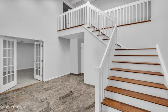 a view of entryway with wooden floor