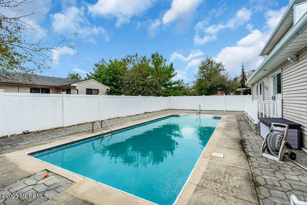 52 16th Street Toms River, NJ 08753 - Photo 42 of 44 a view of a swimming pool with a patio