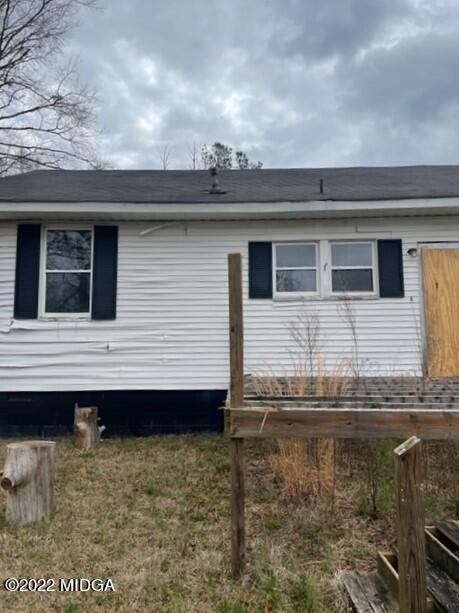 1427 Highway 80 Culloden, GA 31016 - Photo 8 of 8 a view of a house with a balcony