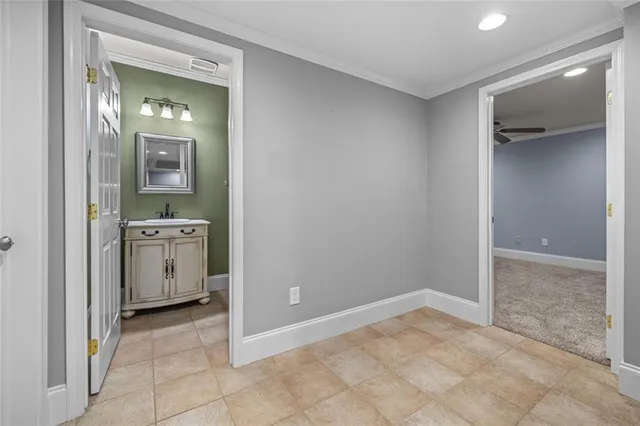 a view of a hallway with washer and dryer