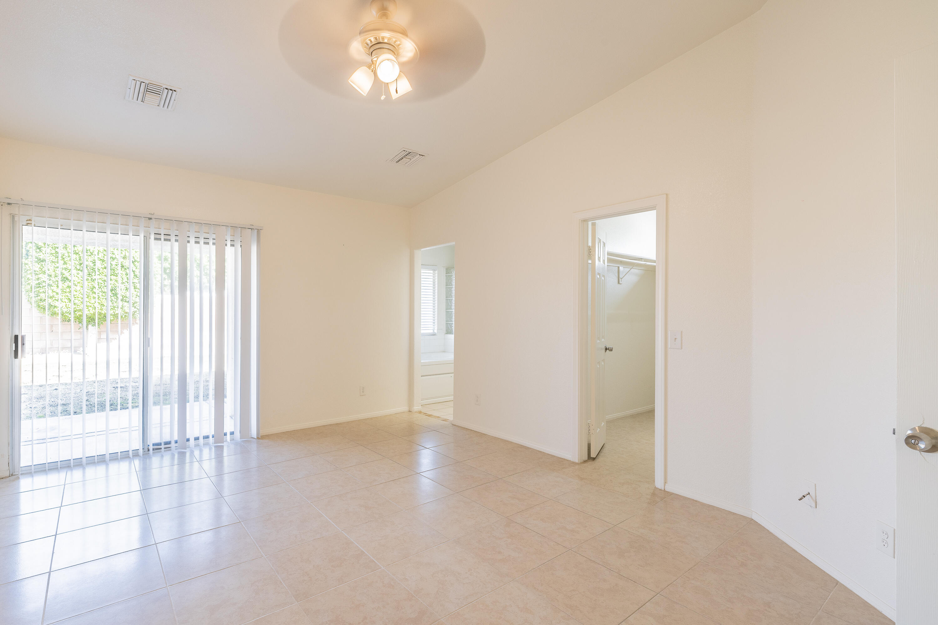 68090 Santelmo Road Cathedral City, CA 92234 - Photo 14 of 29 a view of an empty room with a window