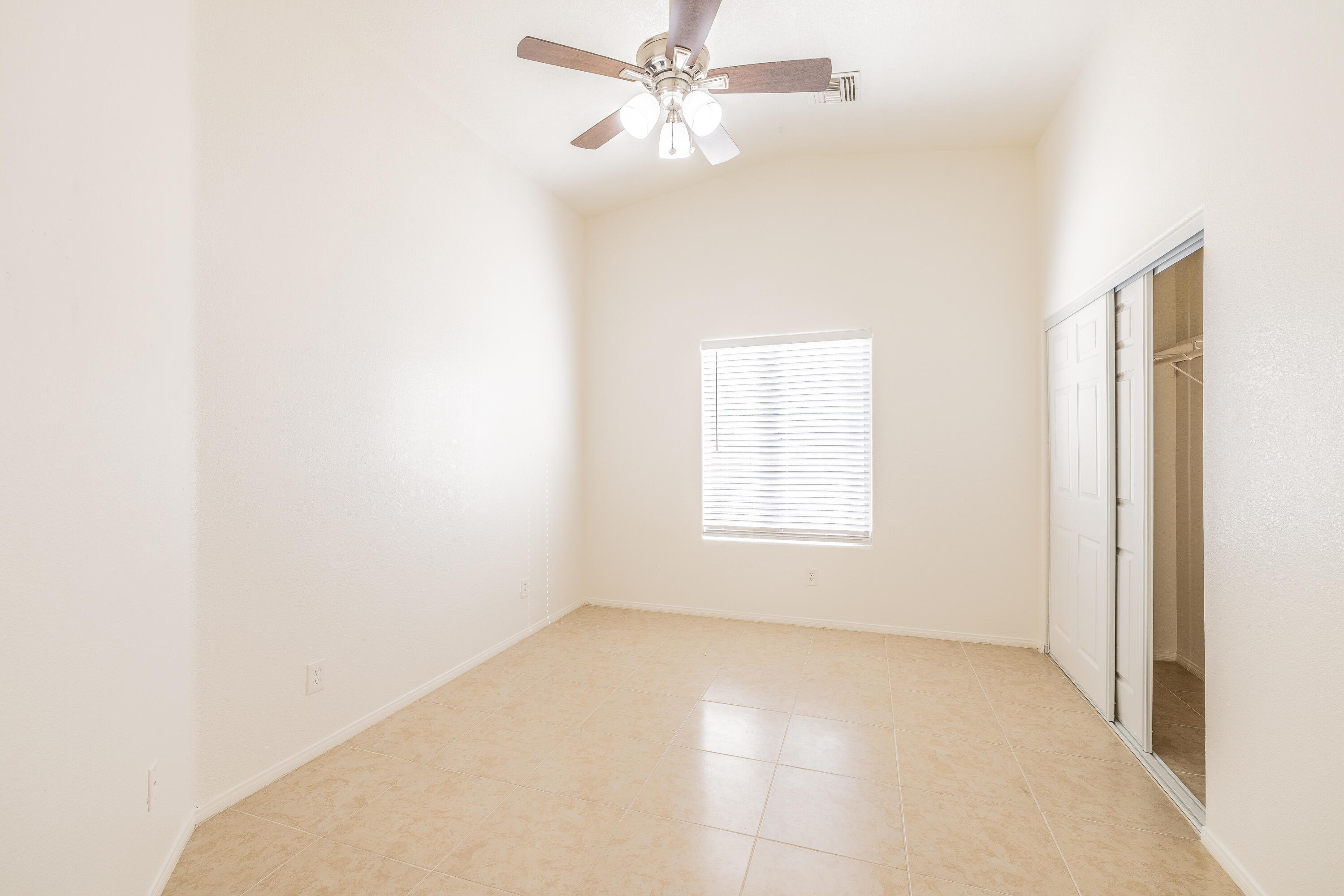 68090 Santelmo Road Cathedral City, CA 92234 - Photo 18 of 29 a view of an empty room with a window