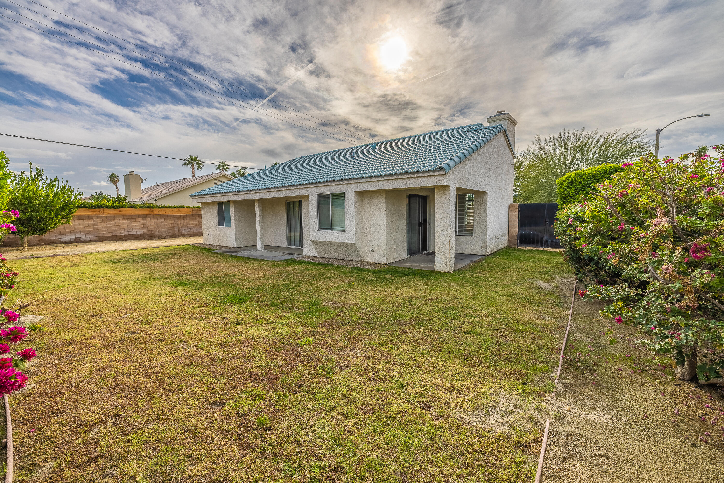 68090 Santelmo Road Cathedral City, CA 92234 - Photo 28 of 29 a view of a house with a backyard