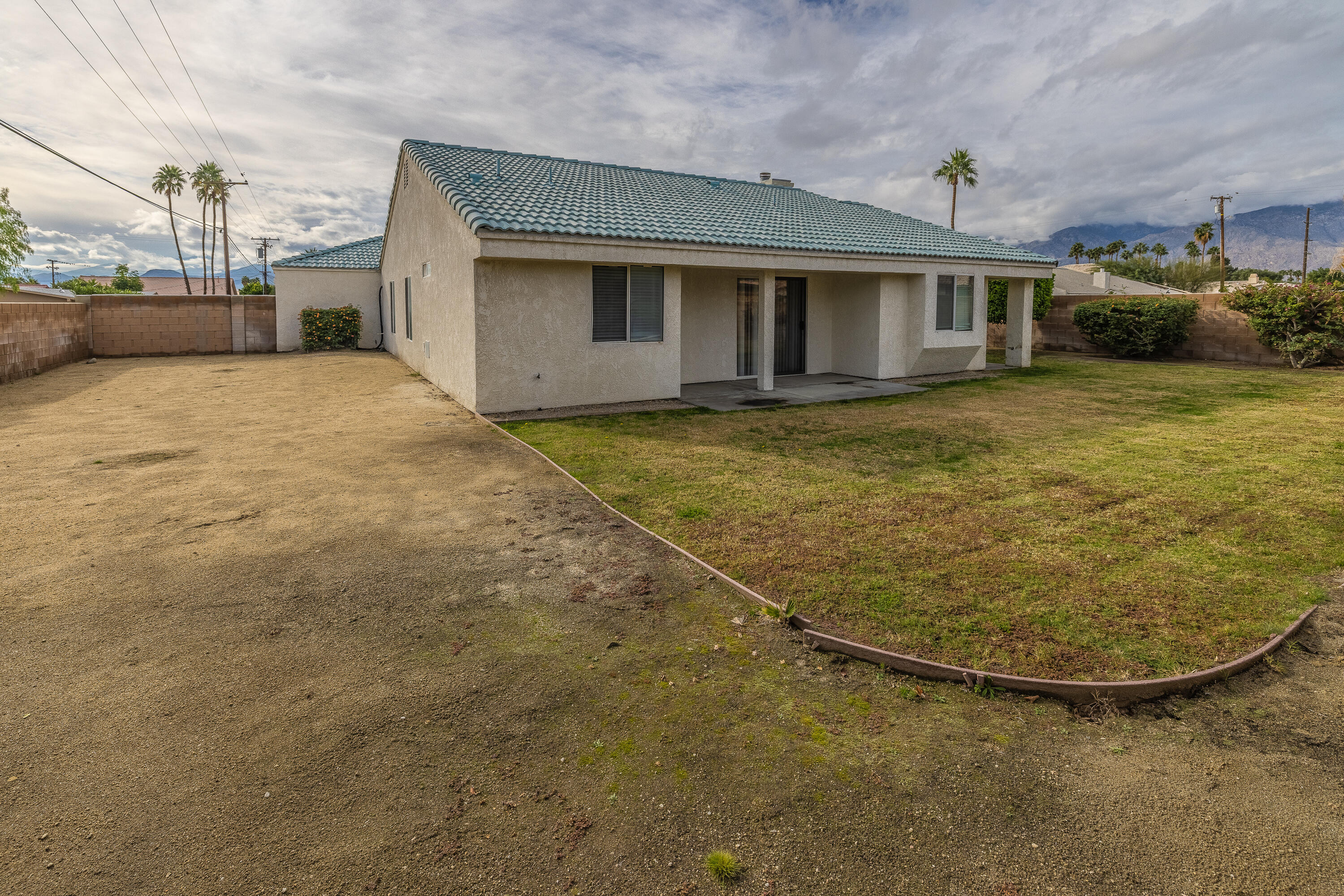 68090 Santelmo Road Cathedral City, CA 92234 - Photo 29 of 29 a view of a house with backyard