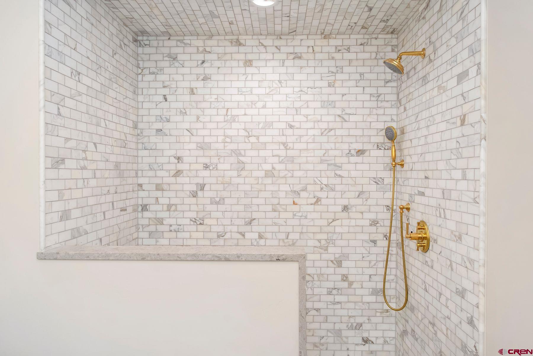 180 Elk Valley Road, Unit 104 Crested Butte, CO 81224 - Photo 11 of 27 a bathroom with a shower