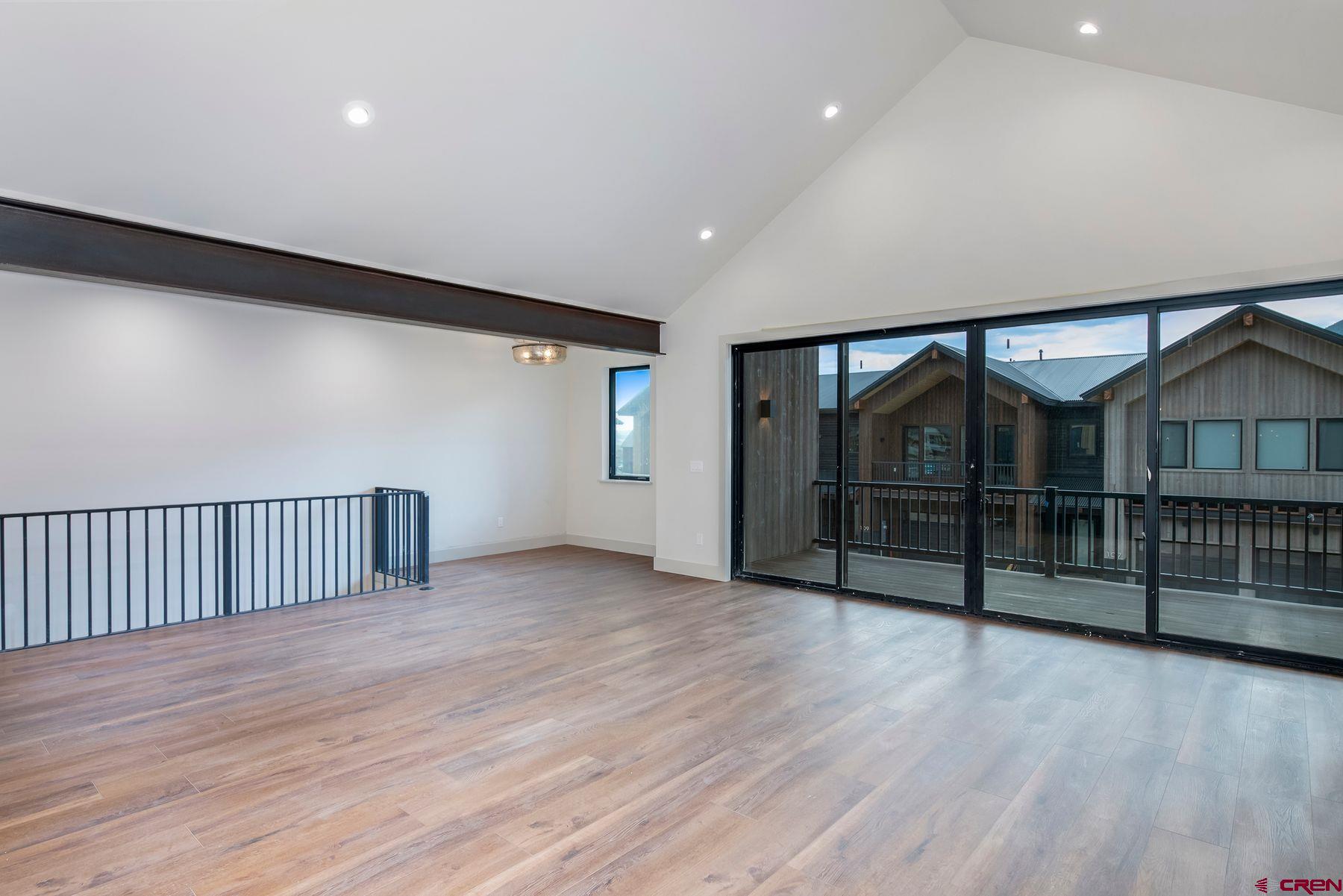 180 Elk Valley Road, Unit 104 Crested Butte, CO 81224 - Photo 2 of 27 a view of entryway with wooden floor