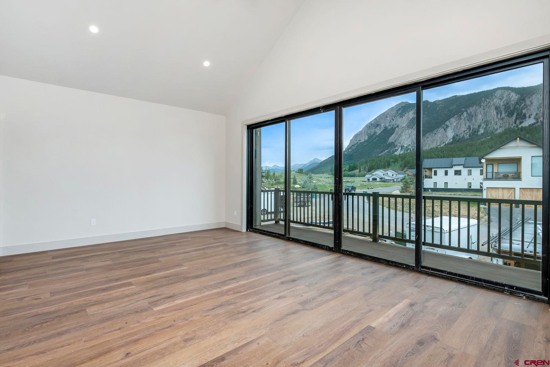 180 Elk Valley Road, Unit 104 Crested Butte, CO 81224 - Photo 5 of 27 a view of hallway with a large window