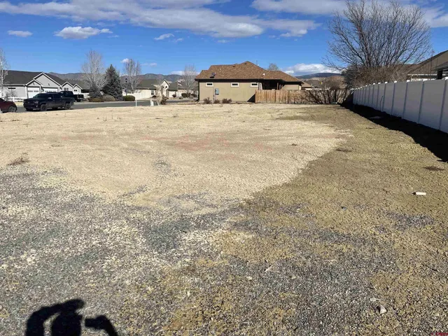 a view of a road with snow on the road