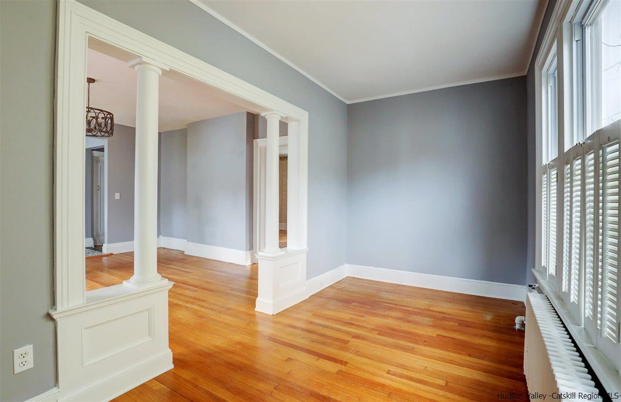 53 Spring Street Kingston, NY 12401 - Photo 13 of 26 a view of empty room with wooden floor and fan