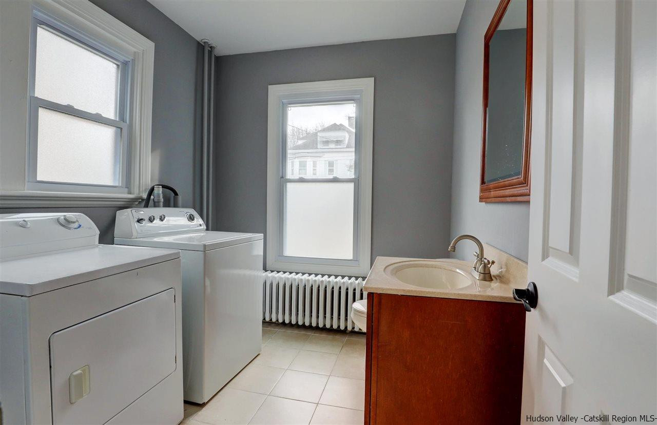 53 Spring Street Kingston, NY 12401 - Photo 22 of 26 a room with a sink and a window