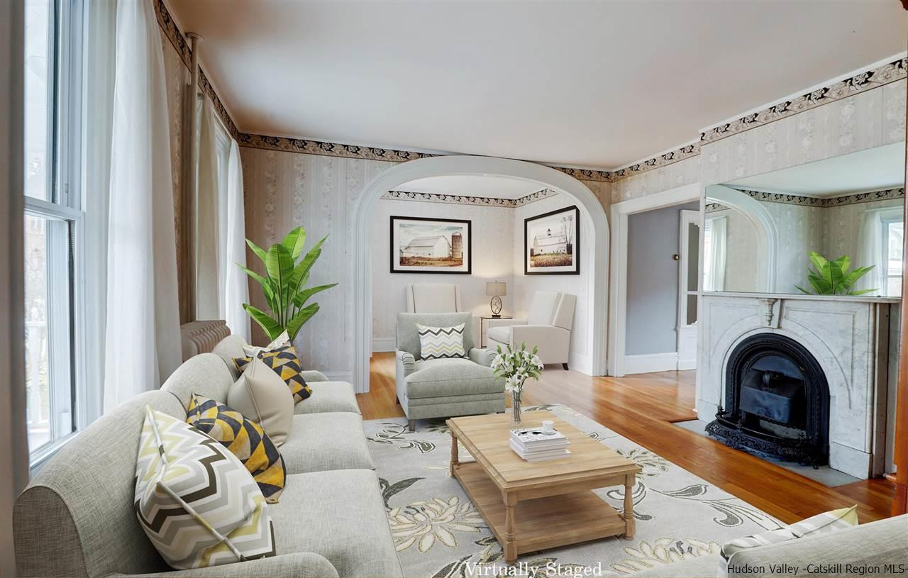 53 Spring Street Kingston, NY 12401 - Photo 3 of 26 a living room with furniture and a fireplace