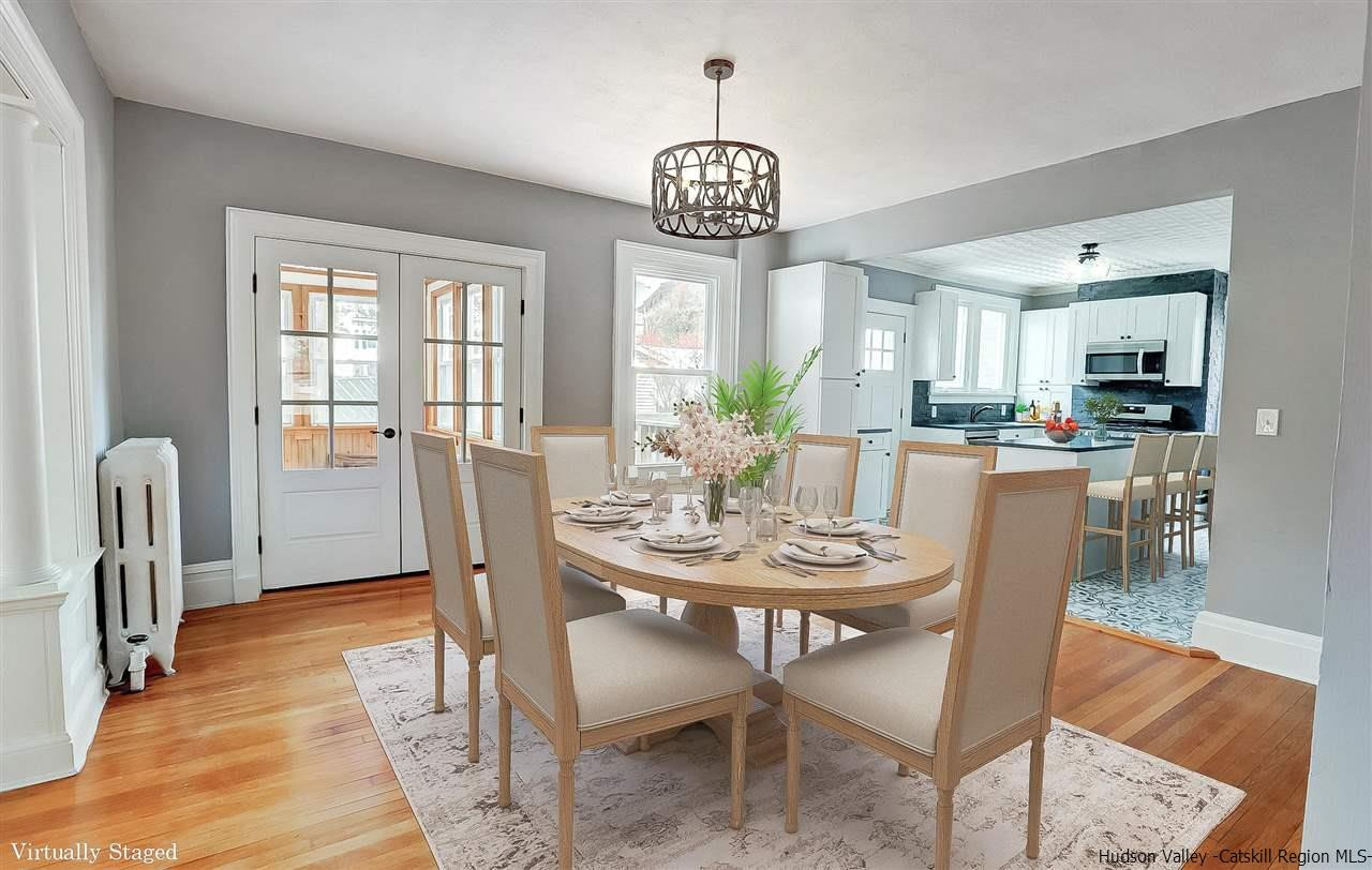 53 Spring Street Kingston, NY 12401 - Photo 6 of 26 a view of a dining room with furniture window and wooden floor